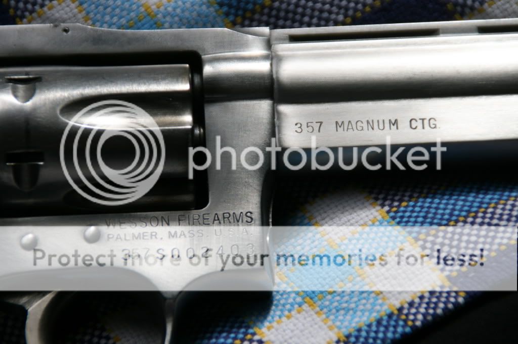 http://i1090.photobucket.com/albums/i377/balsa5/My%20guns/danwesson015_zpsb9a19b54.jpg